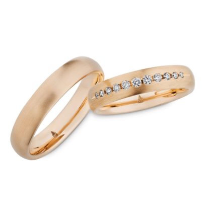 Roségold-Trauringe mit besonderem Brillantbesatz von Juwelier Mommen am Neumarkt in Köln.